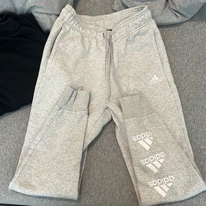 2 pairs of adidas sweats